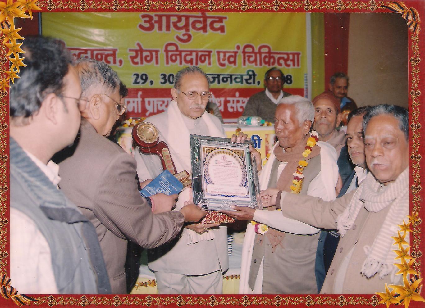 Sh Ashok Sharma giving awards