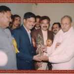 Sh. Ashok Sharma giving awards